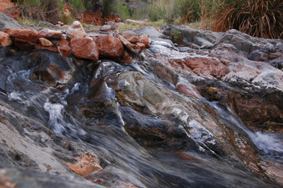 Water spills over a pour off in Boucher Creek