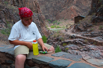 Taking a break for a snack at the river rest house on the morning of our third day