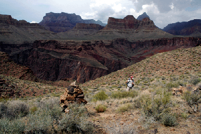 Dennis photographs a cairn marking a route through the Tapeats