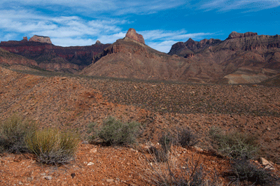 Looking north across Chuar Valley, Siegfried Pyre stands just inside the upper left corner with Butchart Butte seen just to the left of the unnamed butte at the center of the image