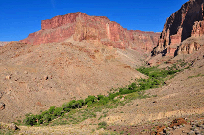 Verdant Deer Creek laces through a golden rolling valley